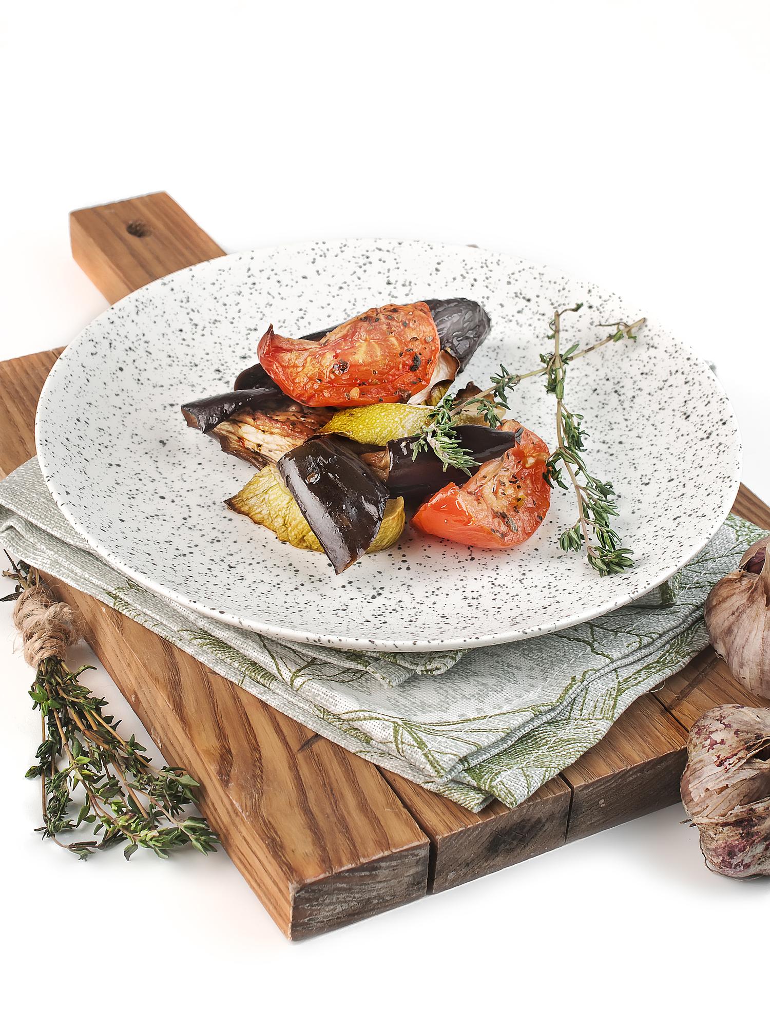 Handcrafted plated dish on wooden table